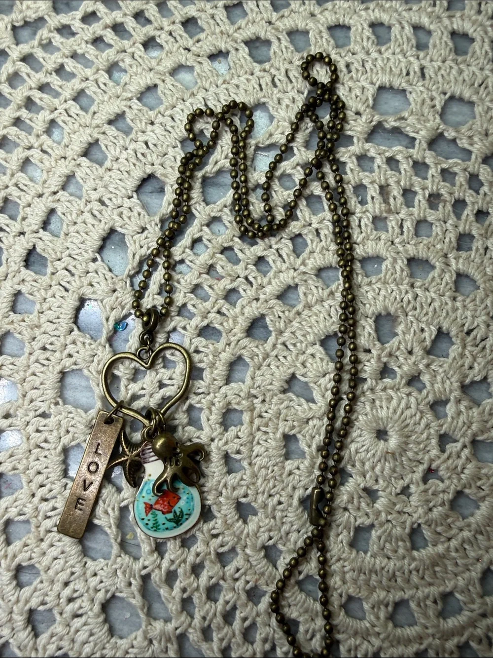 Vintage-Inspired Heart Pendant 26” Necklace with Fish Charm - Antique Brass